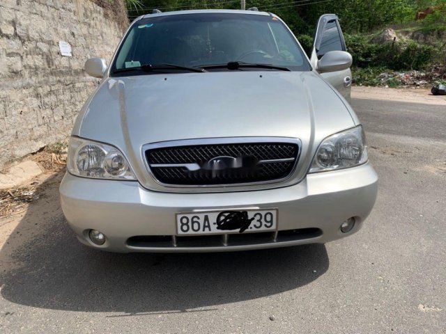 Cần bán xe Kia Carnival năm 2009, màu bạc chính chủ  0