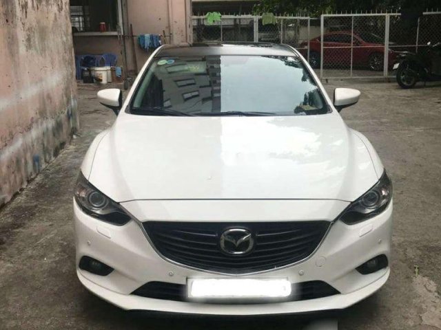 Gia đình bán Mazda 6 năm sản xuất 2014, màu trắng0