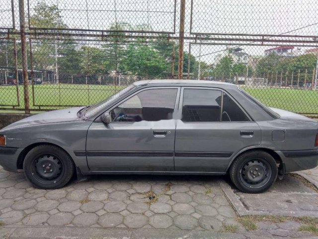 Bán xe Mazda 323 sản xuất năm 1994, màu xám, nhập khẩu nguyên chiếc, giá tốt