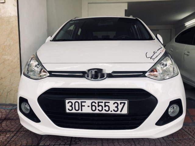 Bán Hyundai Grand i10 năm 2016, màu trắng chính chủ0