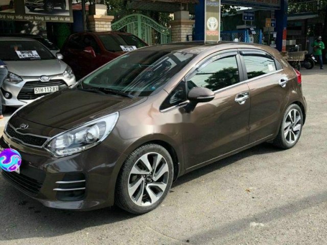 Cần bán Kia Rio sản xuất 2015, màu nâu, nhập khẩu số tự động