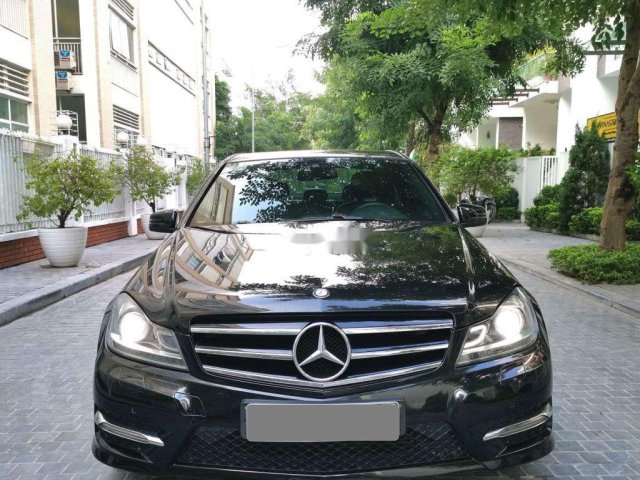 Bán xe Mercedes C200 đời 2014, màu đen, giá 645tr0