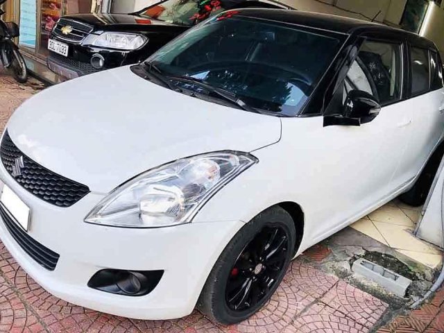 Cần bán xe Suzuki Swift 1.4 AT năm 2014, màu trắng số tự động