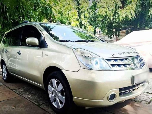 Cần bán lại xe Nissan Grand livina năm sản xuất 2013, màu vàng