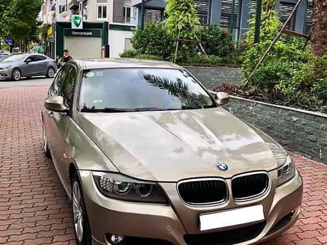 Cần bán xe BMW 320i năm 2011, màu vàng, nhập khẩu 0