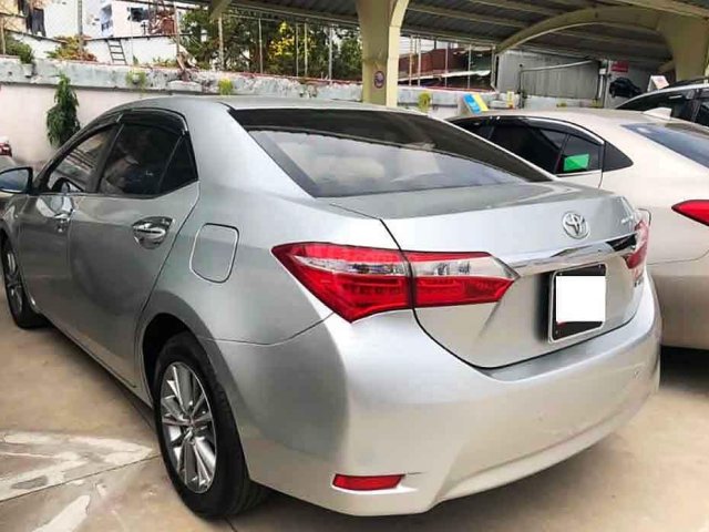 Cần bán lại xe Toyota Corolla Altis sản xuất năm 2015, màu trắng còn mới, 550tr0