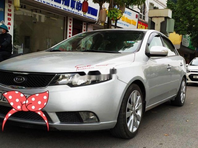 Cần bán gấp Kia Cerato 1.6AT 2009, màu bạc, xe nhập, giá 305tr0