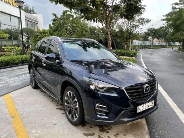 Cần bán lại xe Mazda CX 5 sản xuất năm 2016, màu xanh lam chính chủ0