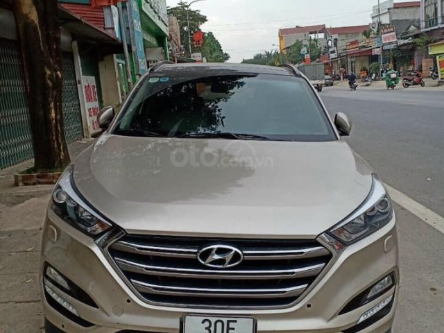 Hyundai Tucson xăng 1.6 Turbo SX 2017, màu vàng cát0