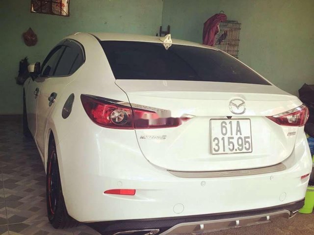 Bán xe Mazda 3 sản xuất 2016, màu trắng còn mới0