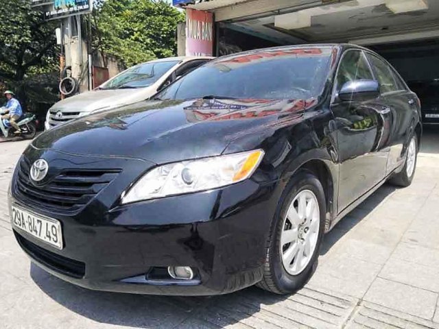 Cần bán Toyota Camry LE 2.4 sản xuất 2007, màu đen, nhập khẩu, giá thấp0