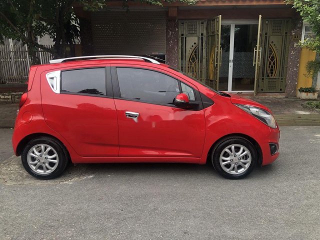 Bán Chevrolet Spark đời 2015, màu đỏ còn mới, giá tốt0