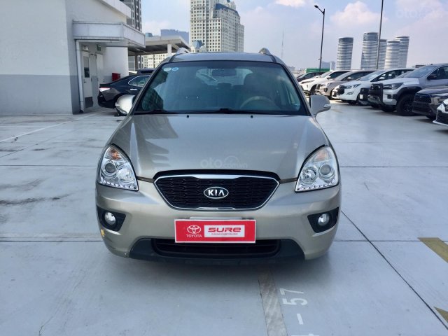 Cần bán xe Kia Carens 1.6AT 2014, màu vàng xe gia đình HCM đi 108.000 km - Xe cũ chính hãng0