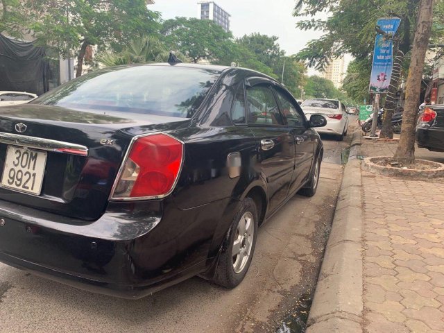 Cần bán xe Daewoo Lacetti năm 2008, màu đen còn mới0