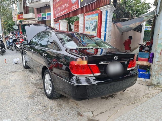 Bán ô tô Toyota Camry đời 2004, màu đen chính chủ, giá tốt