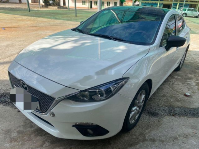 Cần bán Mazda 3 đời 2015, màu trắng còn mới