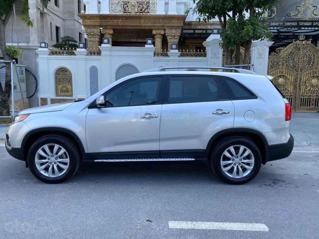 Cần bán Kia Sorento 2013, màu bạc chính chủ0