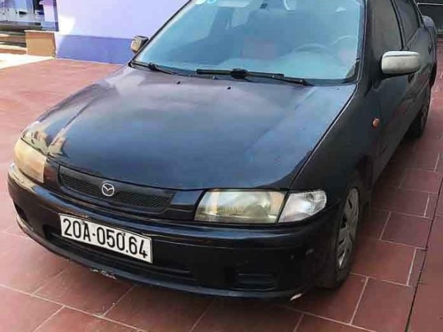 Bán ô tô Mazda 323 năm sản xuất 1998, màu đen, 65tr0