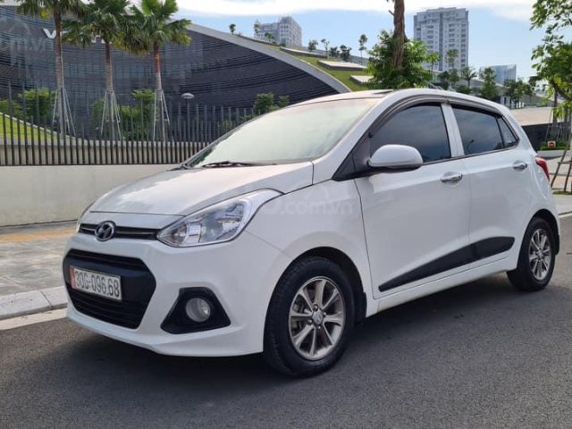 Bán Hyundai Grand i10 1.2 AT sản xuất 2016 nhập khẩu, màu trắng0