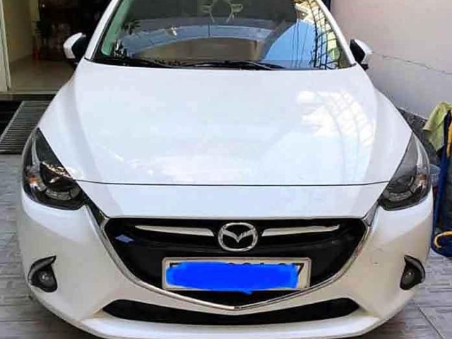 Cần bán gấp Mazda 2 đời 2016, màu trắng chính chủ, 458 triệu0