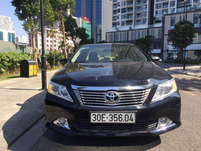 Cần bán xe Toyota Camry 2014, màu đen chính chủ, 668 triệu0