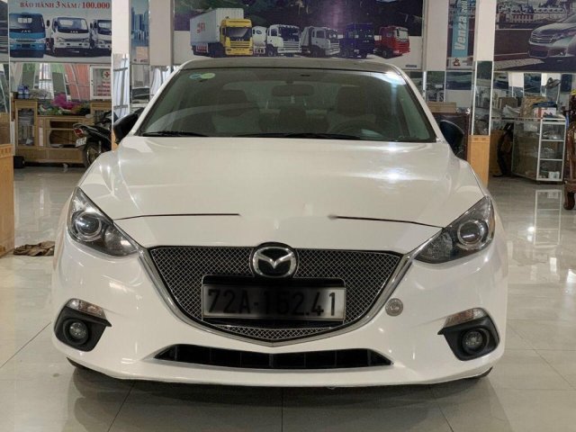 Cần bán lại xe Mazda 3 năm sản xuất 2015, màu trắng, nhập khẩu nguyên chiếc0