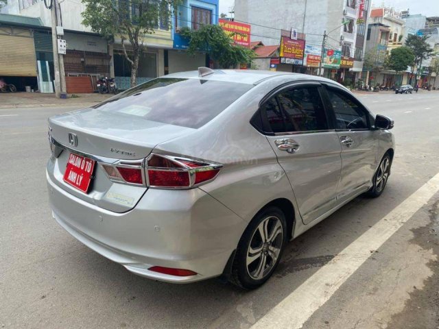 Cần bán xe Honda City đời 2016, màu bạc, số tự động0