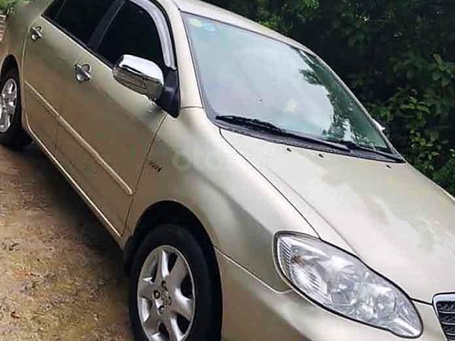 Bán xe Toyota Corolla Altis 2004, màu vàng cát0