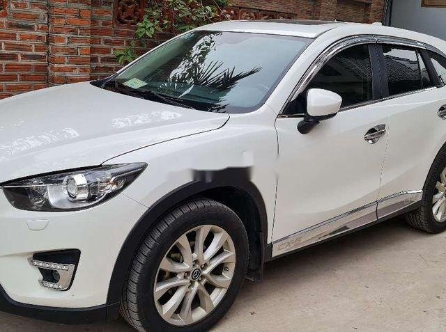 Cần bán lại xe Mazda CX 5 năm 2013, màu trắng, nhập khẩu nguyên chiếc 