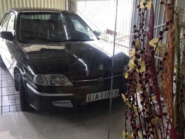 Cần bán Ford Laser đời 2000, màu đen còn mới