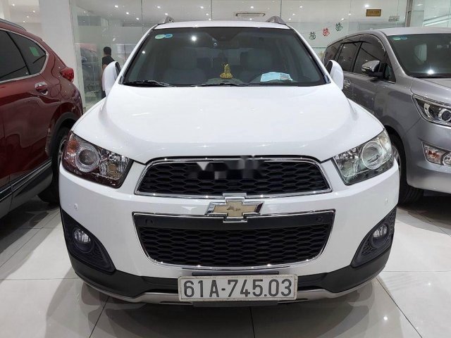 Cần bán xe Chevrolet Captiva năm 2014, màu trắng chính chủ0