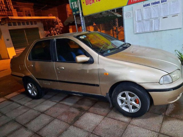 Xe Fiat Siena sản xuất năm 2002, màu vàng, nhập khẩu 