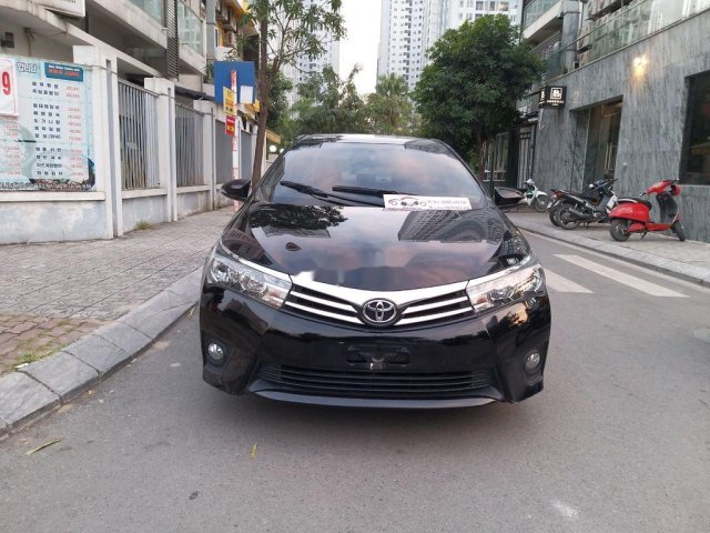 Cần bán xe Toyota Corolla Altis đời 2016, màu đen chính chủ, giá 620tr