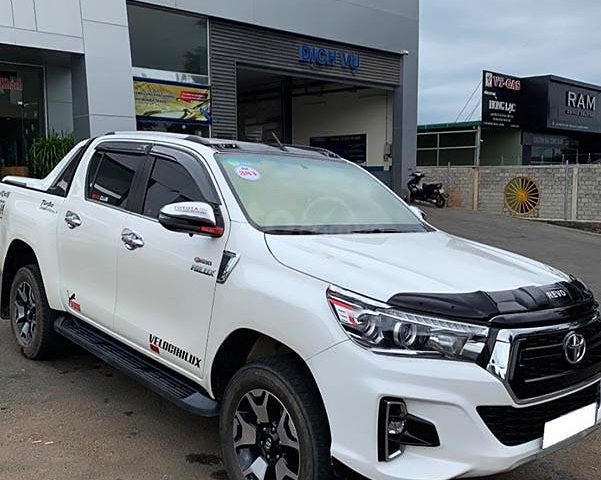 Cần bán xe Toyota Hilux 2.8G 4x4 AT sản xuất 2019, màu trắng, nhập khẩu