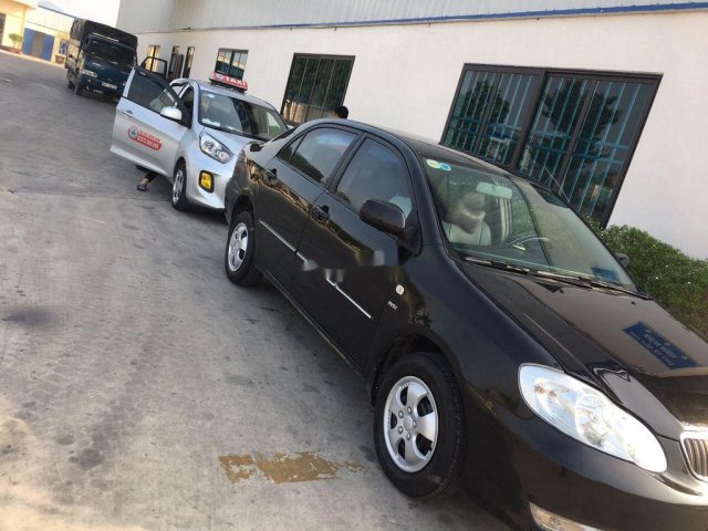 Bán ô tô Toyota Corolla Altis 2004, màu đen chính chủ0