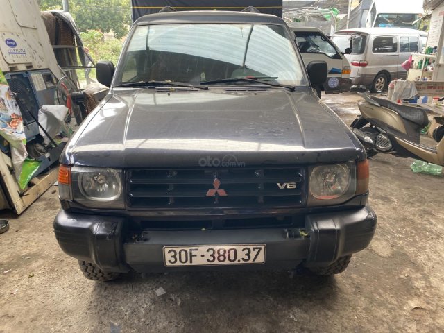 Mitsubishi Pajero xe năm 2003 màu xanh ghi