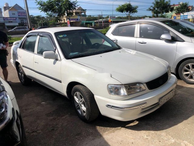 Cần bán gấp Toyota Corolla đời 1999, màu trắng chính chủ0