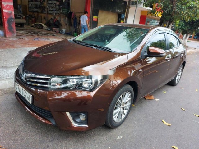 Bán Toyota Corolla Altis đời 2015, màu nâu còn mới, 495tr0