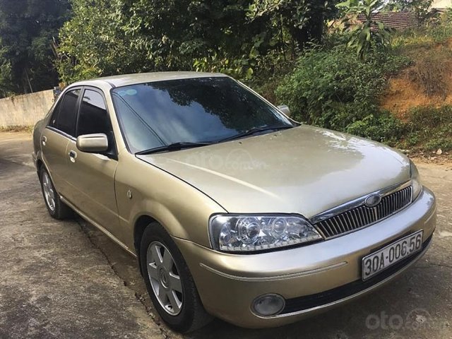 Bán Ford Laser năm 2003, màu vàng còn mới