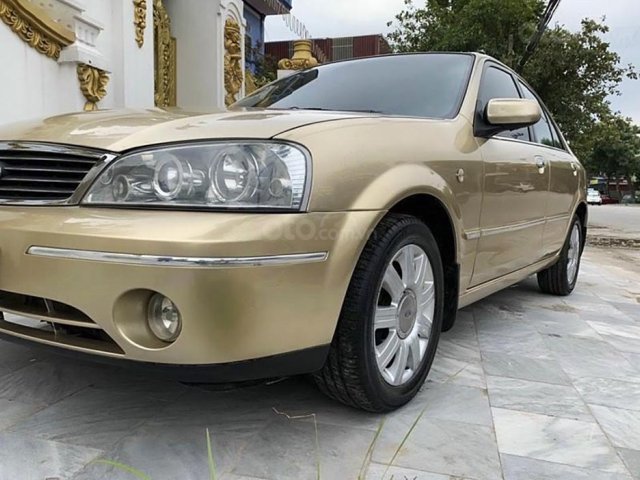 Bán Ford Laser năm 2003, màu vàng còn mới