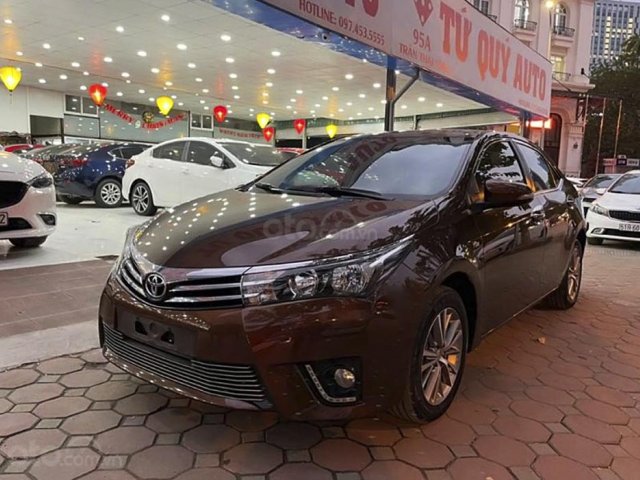 Xe Toyota Corolla 1.8G sản xuất năm 2015, màu nâu, 595tr0