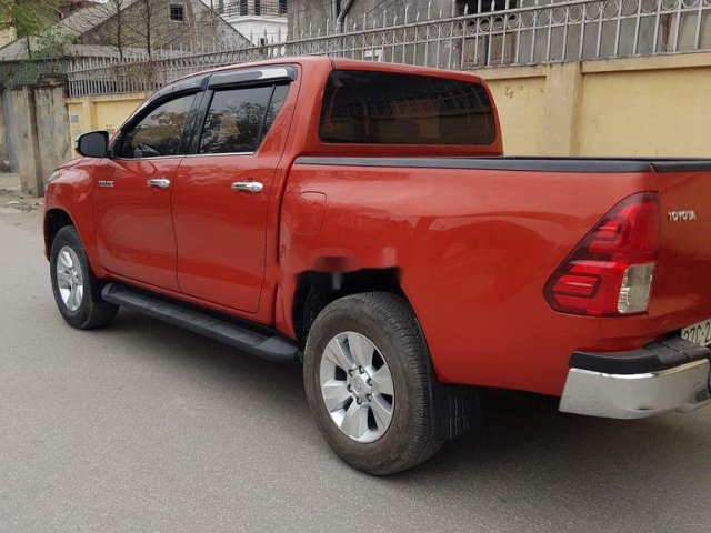 Bán Toyota Hilux sản xuất năm 2016, màu đỏ, xe nhập 