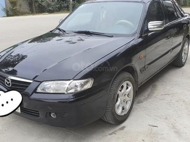 Xe Mazda 626 năm sản xuất 2002, màu đen, xe còn mới0