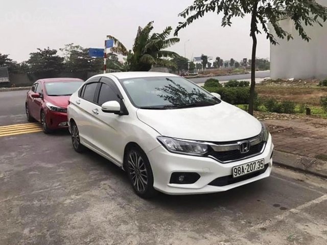 Cần bán gấp Honda City sản xuất năm 2018, màu trắng còn mới0