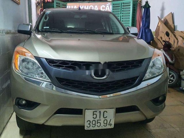 Cần bán gấp Mazda BT 50 năm 2014, màu vàng, xe nhập