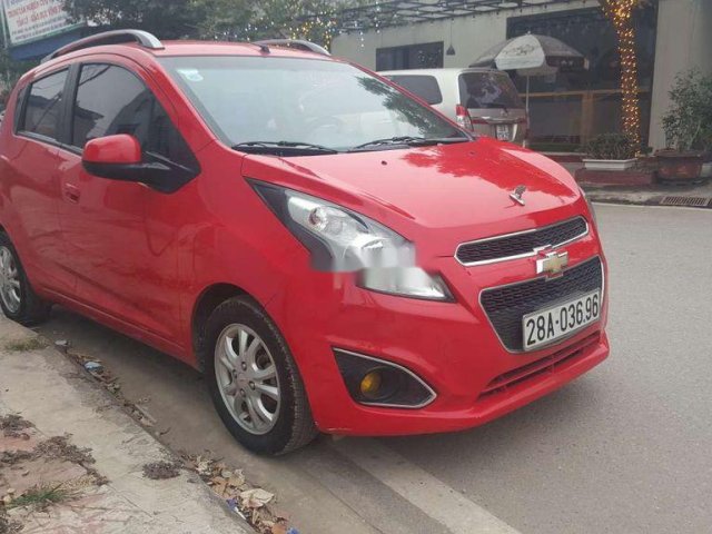 Cần bán gấp Chevrolet Spark sản xuất năm 2013, màu đỏ 