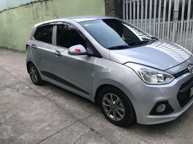 Bán xe Hyundai Grand i10 năm 2015, màu bạc, 312tr0