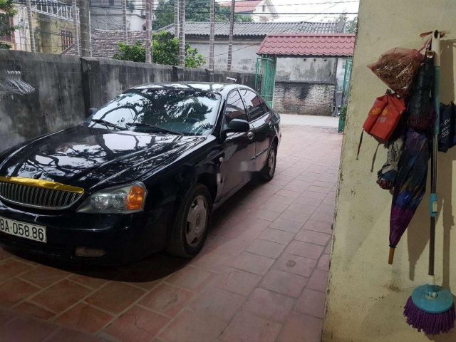 Bán Daewoo Magnus đời 2004, màu đen, nhập khẩu, 83 triệu