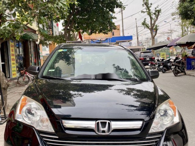 Cần bán gấp Honda CR V năm sản xuất 2007, màu đen0