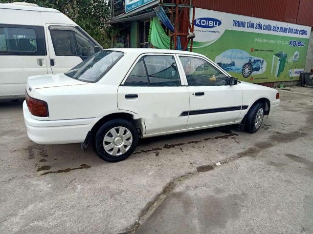 Bán Mazda 323 đời 1995, màu trắng, nhập khẩu0